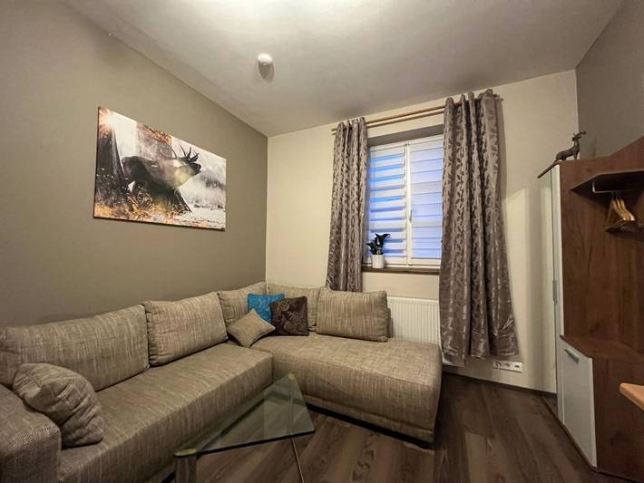 Ferienwohnung für 3 Personen, mit Terrasse und Garten sowie Ausblick