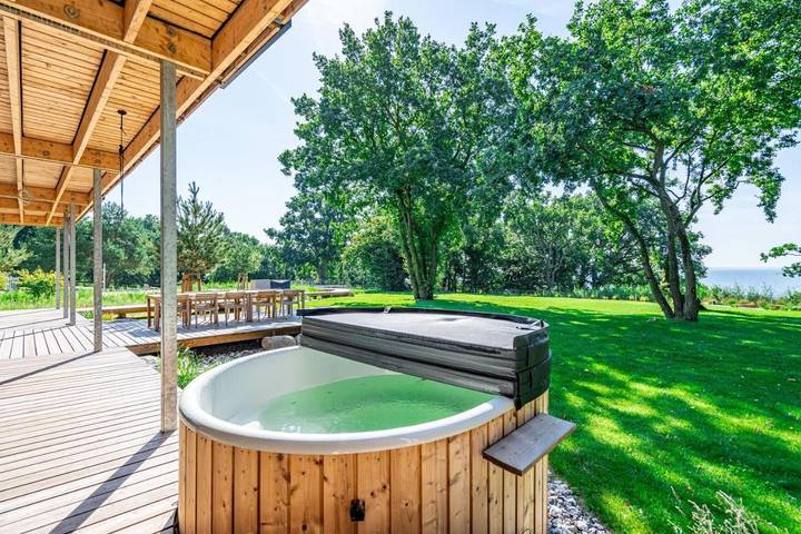 Ferienhaus für 16 Personen, mit Terrasse und Sauna sowie Garten und Seeblick, mit Haustier in Garz