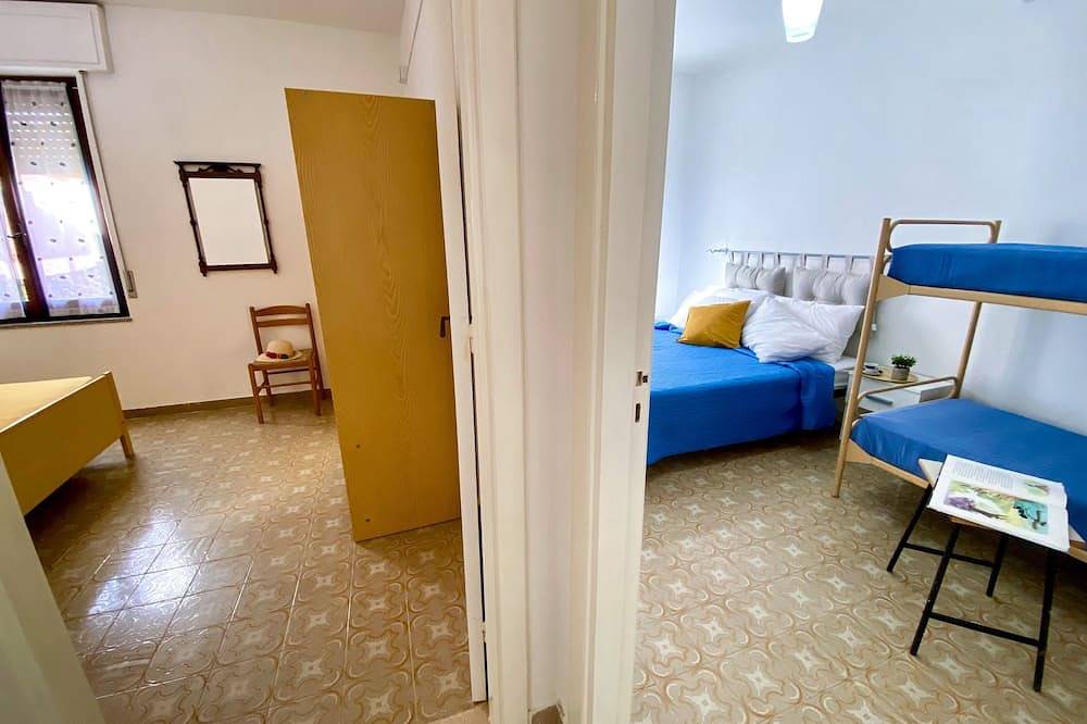 Casa Vacanze con Cortile a 20 Passi Dalla Spiaggia per Famiglie e Gruppi in Sa Rocca Tunda, Sardegna