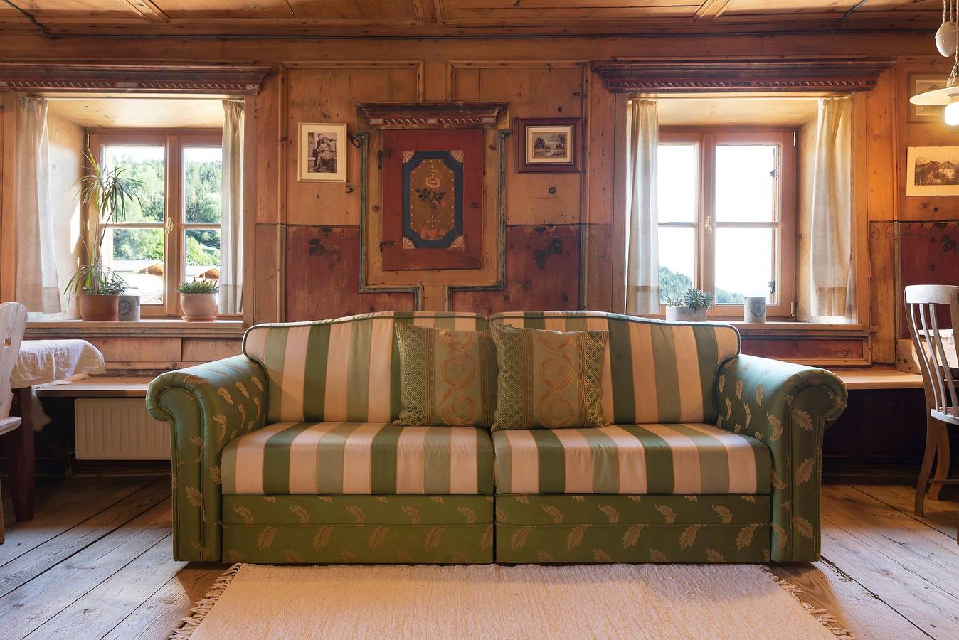 Appartamento intero, Storico appartamento vacanze Huber Stube con vista sulle montagne, balcone e Wi-Fi in Albions, Laion