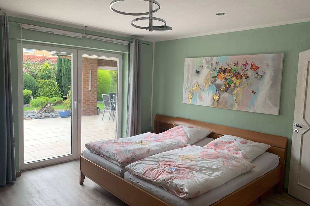 Ferienhaus Wesergarten mit Kamin, großem Garten und gepflegtem Fischteich in Rinteln, Landkreis Schaumburg