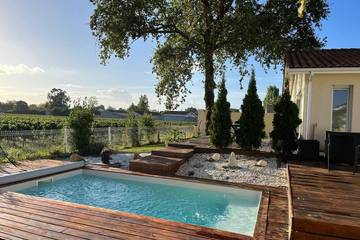 Location de vacances pour 10 personnes, avec piscine et jacuzzi à Cussac-Fort-Médoc