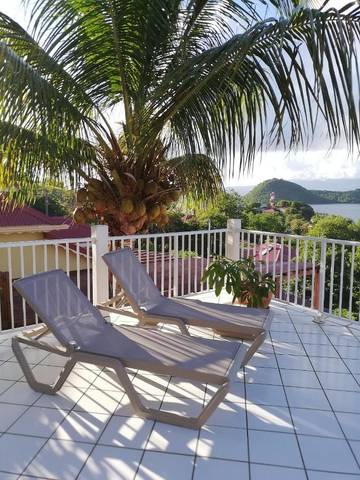 Location de vacances pour 7 personnes, avec vue et jardin dans Anse Rodrigue Terre De Haut