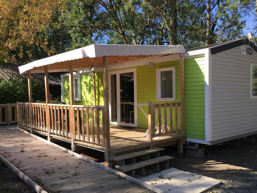 Flower Camping  Les Granges - Mobilhome 4 personnes - Pmr Confort 34 m² (2 chambres) + terrasse couverte in Luynes, Région de Tours