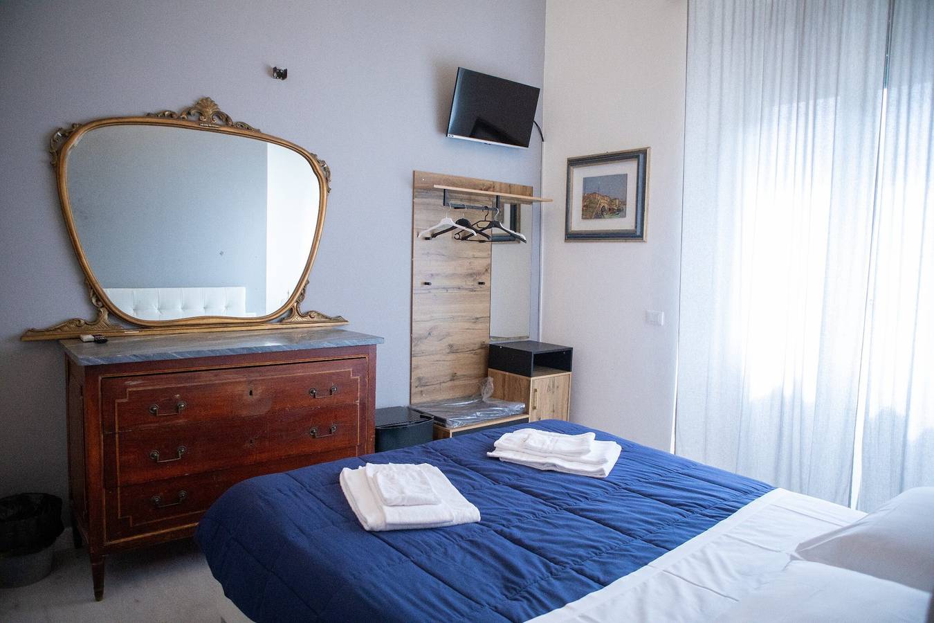 Habitación 'Camera Orchidea - Triple' con jardín compartido, Wi-Fi y aire acondicionado in Prato, Provincia de Prato