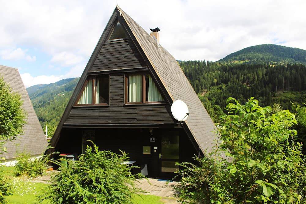 Schönes Ferienhaus im Nurdach-Stil fußläufig vom See in Afritz am See, Villach-Land