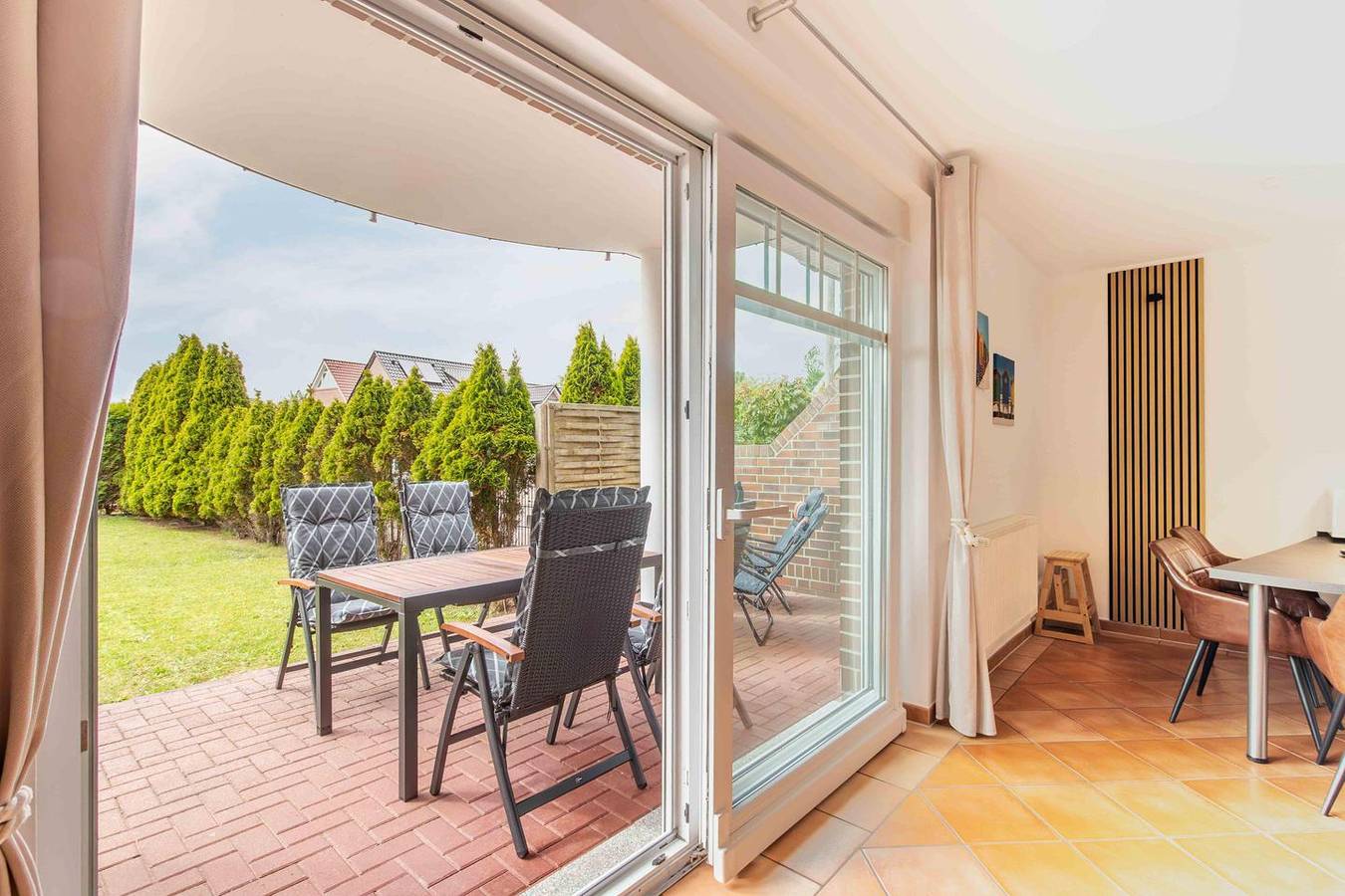 Ganze Wohnung, Südoase - Moderne Ferienwohnung mit Terrasse & Garten in ruhiger Lage in Borkum