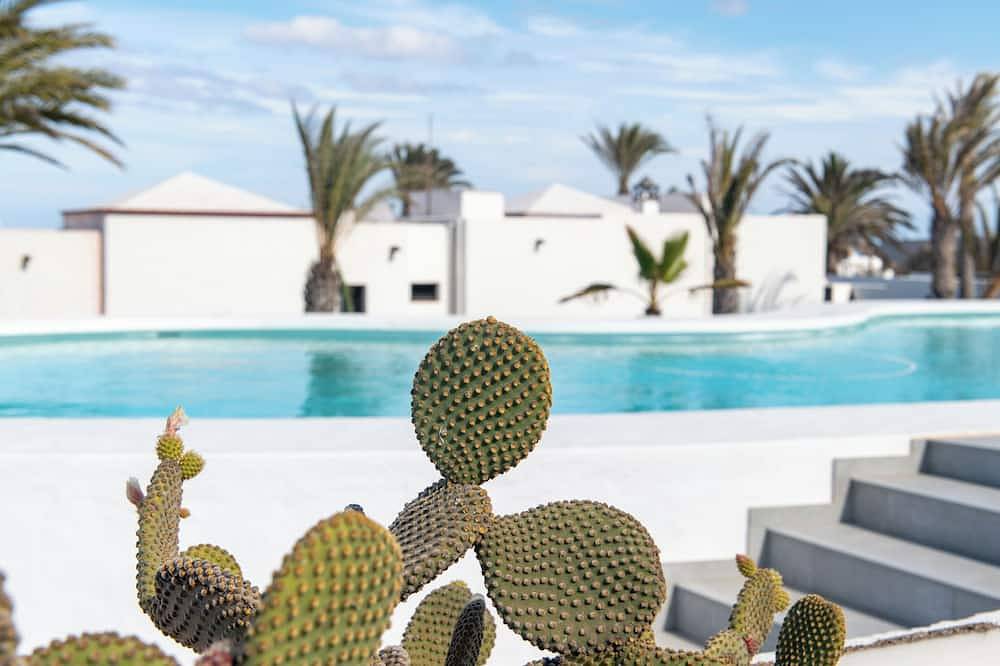 Appartement entier, Villa Blanca, Fkk-apartment Nr. 2 in Charco del Palo mit Schwimmbad, Meernähe in Charco del Palo, Haría