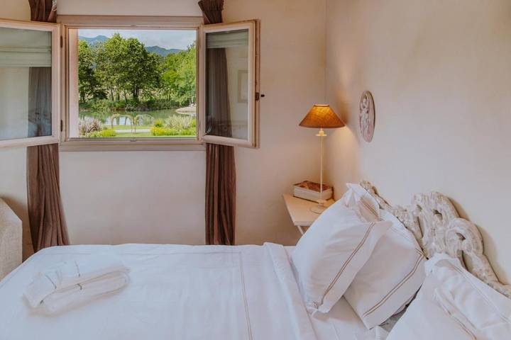 Agriturismo per 2 persone, con giardino e panorama nonché piscina, con animali domestici a Puegnago del Garda
