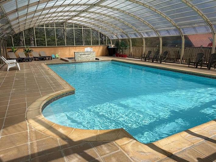Parc de vacances pour 3 personnes, avec Terrasse et Jardin ainsi que Bassin pour enfant et Piscine en Dordogne