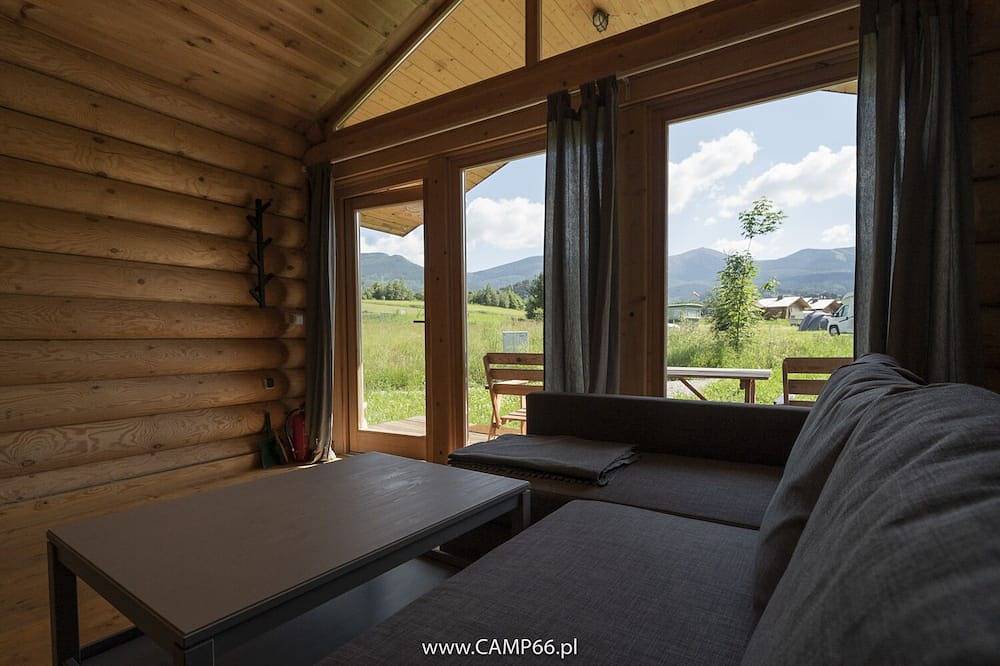 Camp66  - Drewniane domki z bali z widokiem na Śnieżke  in Sciegny, Sudeti (Polonia)
