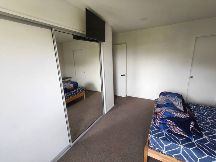 Rom for 3 personer, med hage i New Zealand