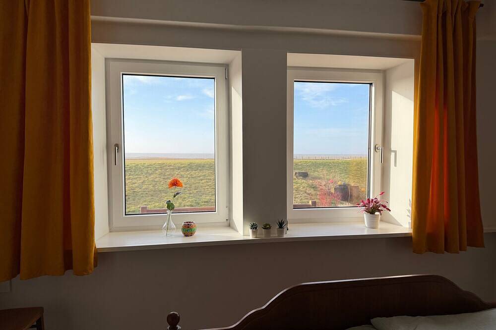 Ferienwohnung Blütenreich mit Meerblick im Langhaus Aussichtsreich in Oland, Langeneß