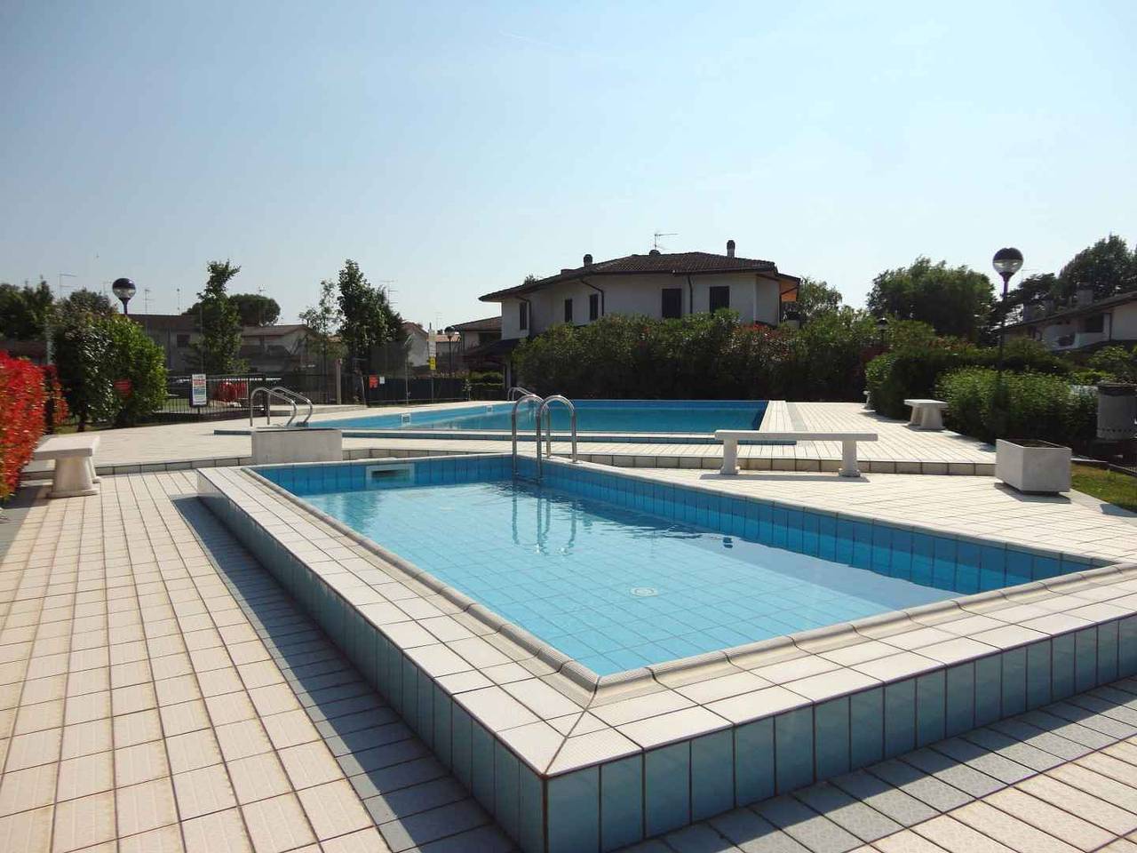 Villa Holiday village with swimming pool and tennis court a stone's throw from the sea and the pedestrian area in Porto Santa Margherita, Caorle