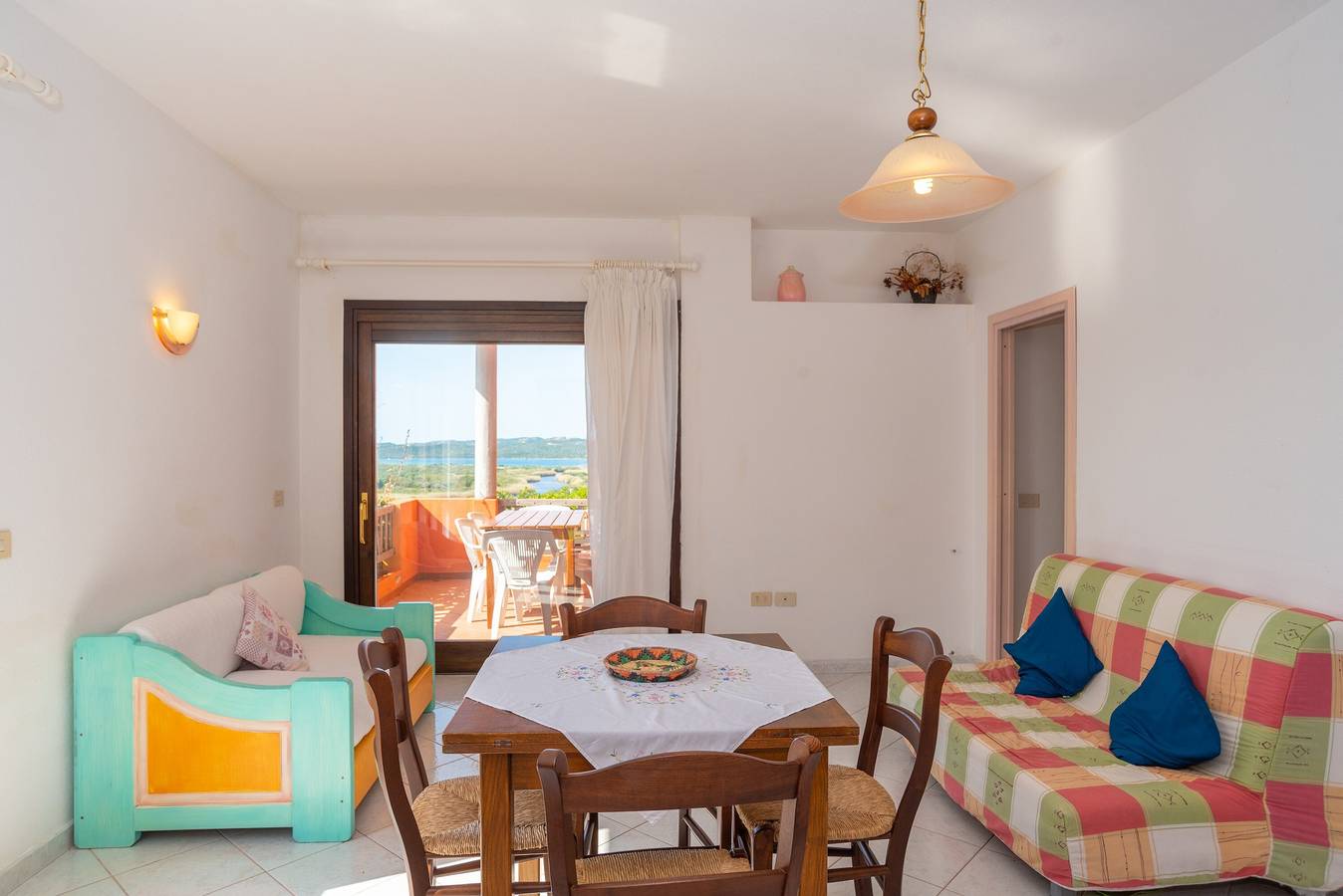 Appartamento intero, Appartamento "Conchiglia Rosa" con giardino condiviso, vista mare e Wi-Fi in Barrabisa, Palau (Sardegna)