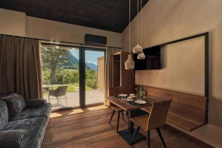 Exclusive 2-Bedroom Chalet with an Infinity Pool in Terlano, Alpi Sarentine