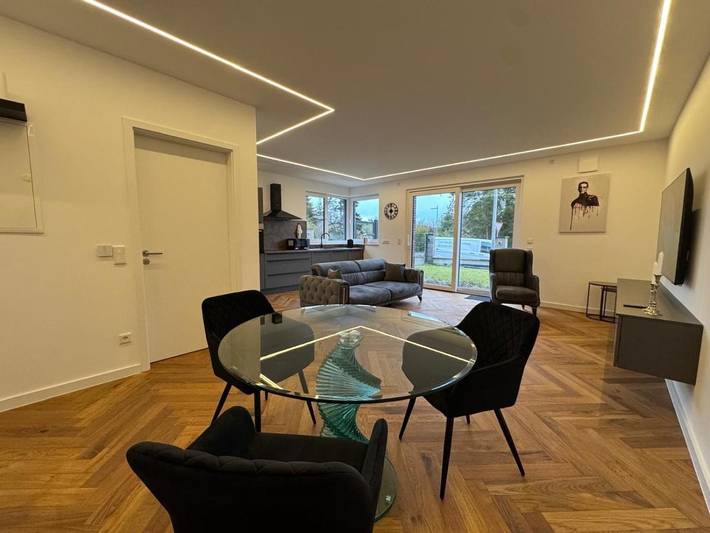 Ferienwohnung für 3 Personen, mit Terrasse und Garten sowie Ausblick