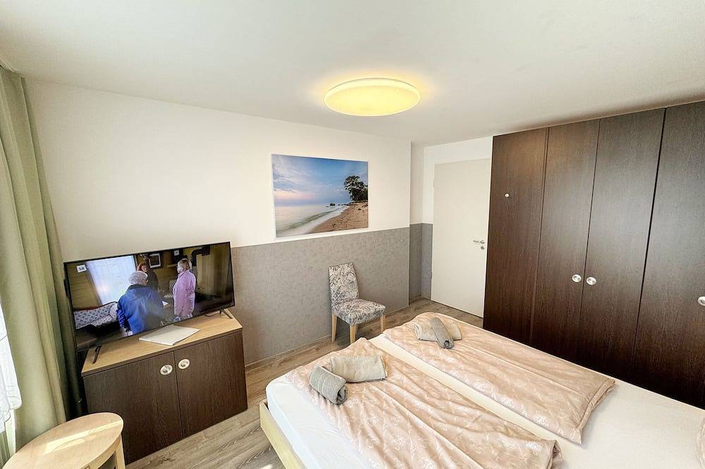 Ganze Wohnung, Wohnung 02 mit Terrasse und Boddenblick - Mr: Haus Inselperle mit Blick auf den in Alt Reddevitz, Mönchgut