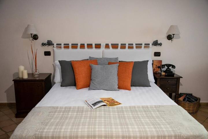 Chambre pour 4 personnes, avec Terrasse ainsi que Jardin et Piscine dans Maschito