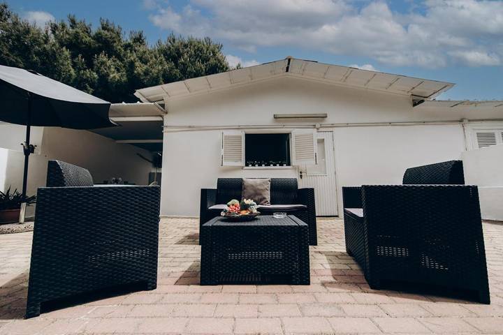 Appartamento per 2 persone, con Terrazza e Giardino nonché Panorama a Leporano Marina