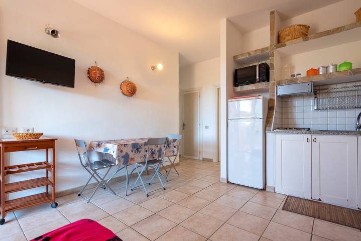 Holiday Home "Pergola 706" Steps from the Beach with A/C and Private Terrace in Spiaggia La Pelosa, Stintino