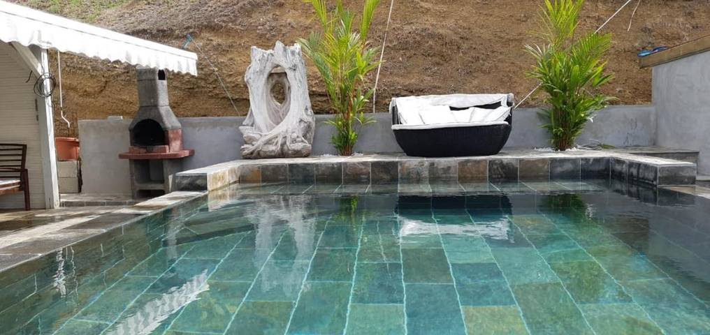 Appartement de vacances pour 4 personnes, avec piscine ainsi que jardin et vue