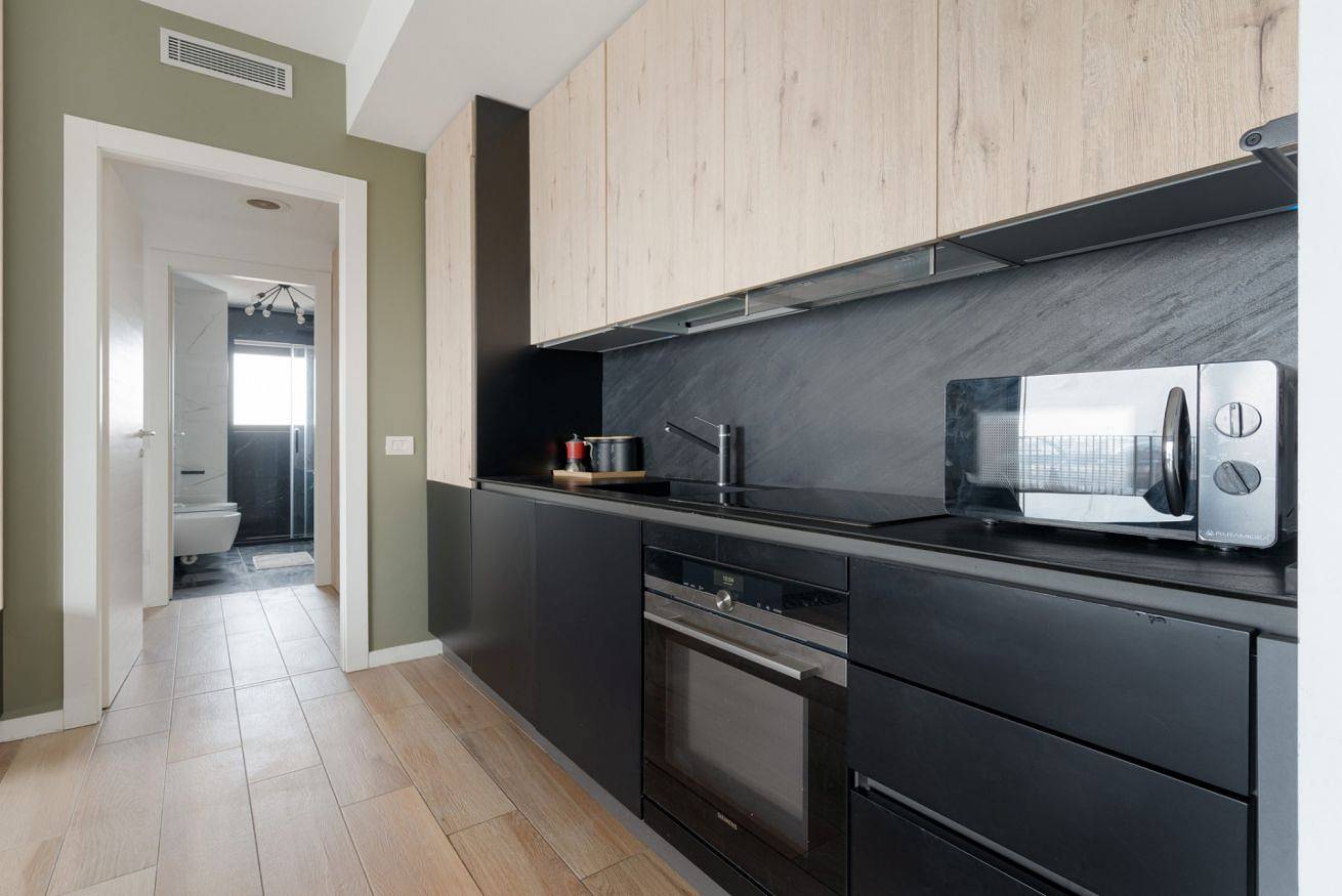 Guesthost - Cascina Merlata Flat with Terrace, foto 14
