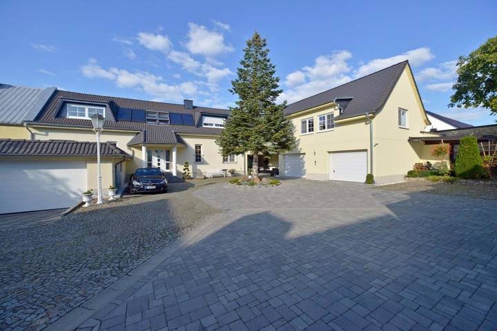 Ferienwohnung für 4 Personen, mit Terrasse und Garten sowie Ausblick in Teltow