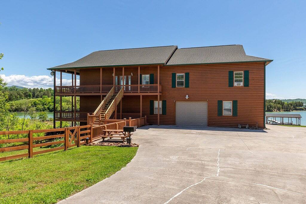 Pet-Friendly Luxury Home With Incredible Outdoor Living, Private Dock + Hot Tub in Douglas Lake