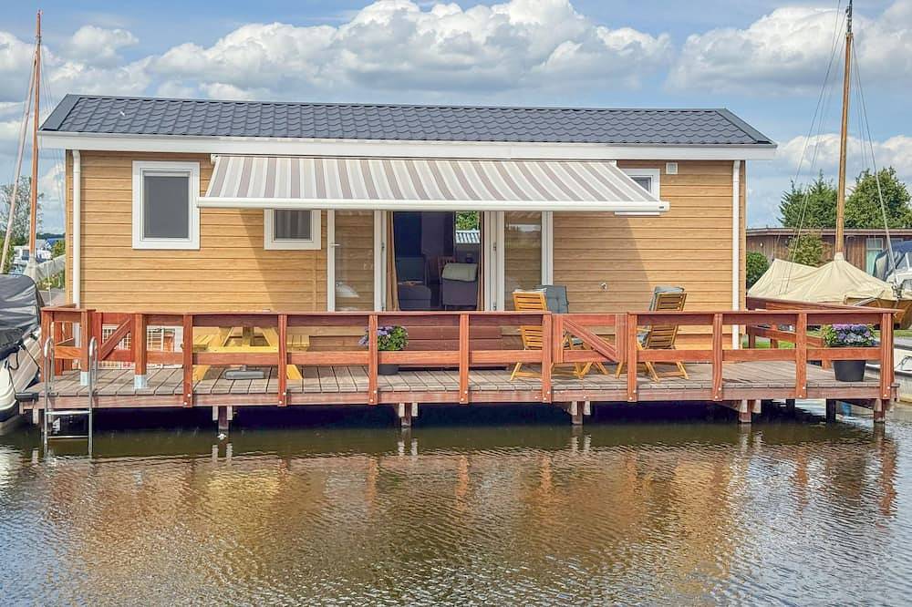 Modern chalet aan het water, met airco en terras in Breukelen, Groene Hart