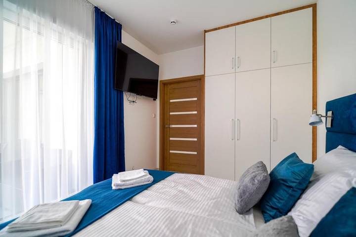 Apartament wakacyjny dla 4 osób, z Balkon i Widok na jezioro w Grzybowo