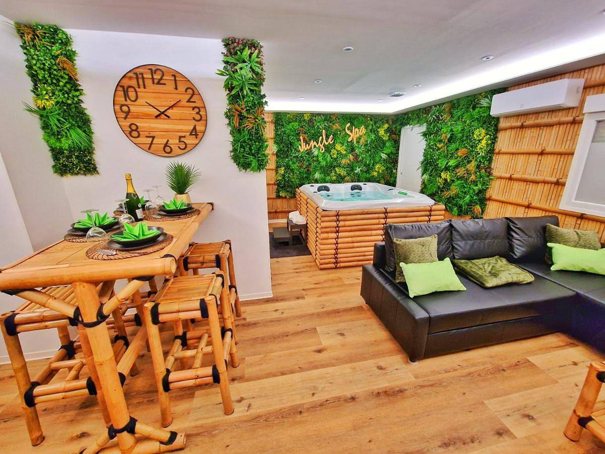 Appartement entier, Jungle Spa-4 Pers-Jacuzzi-Parking-Jardin-Clim-Colmar in Muntzenheim, Région de Colmar