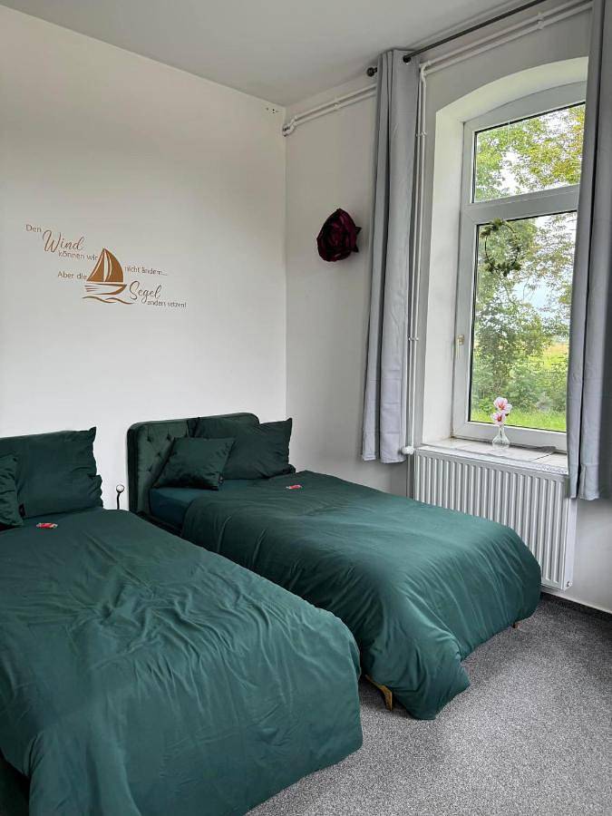 Ferienwohnung für 2 Personen, mit Terrasse und Garten sowie Ausblick