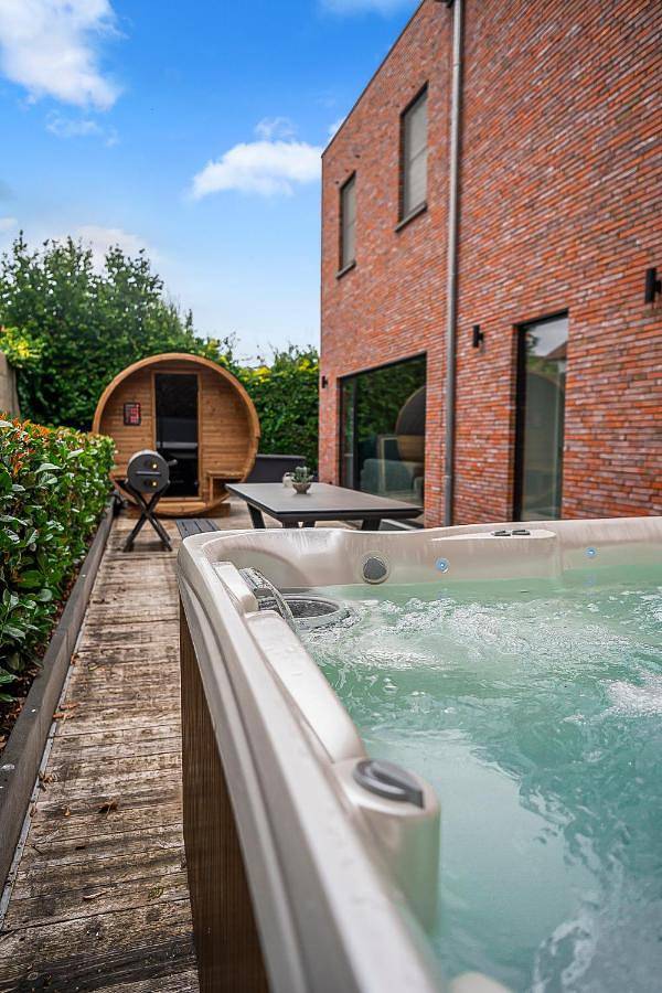 Maison de vacances pour 10 personnes, avec Jacuzzi et Terrasse ainsi que Jardin et Sauna à Riemst