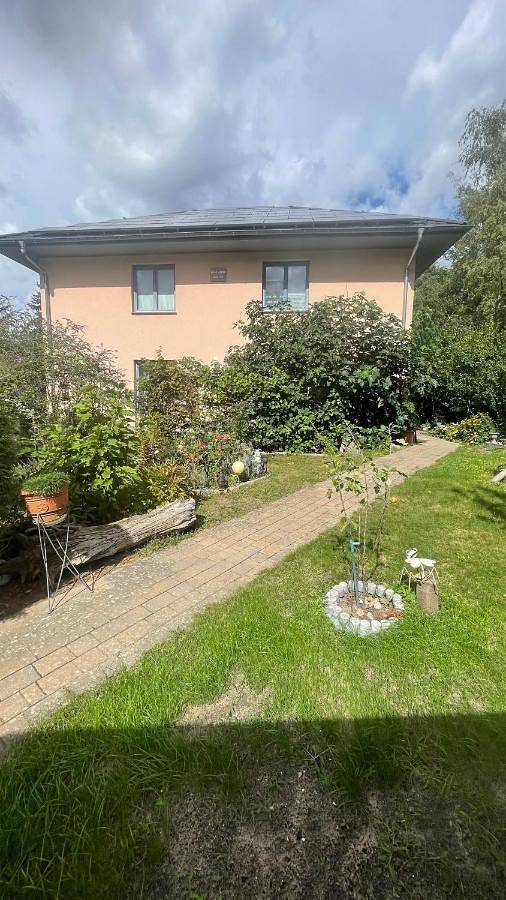 Ferienwohnung für 4 Personen, mit Terrasse und Garten sowie Sauna und Ausblick in Woltersdorf