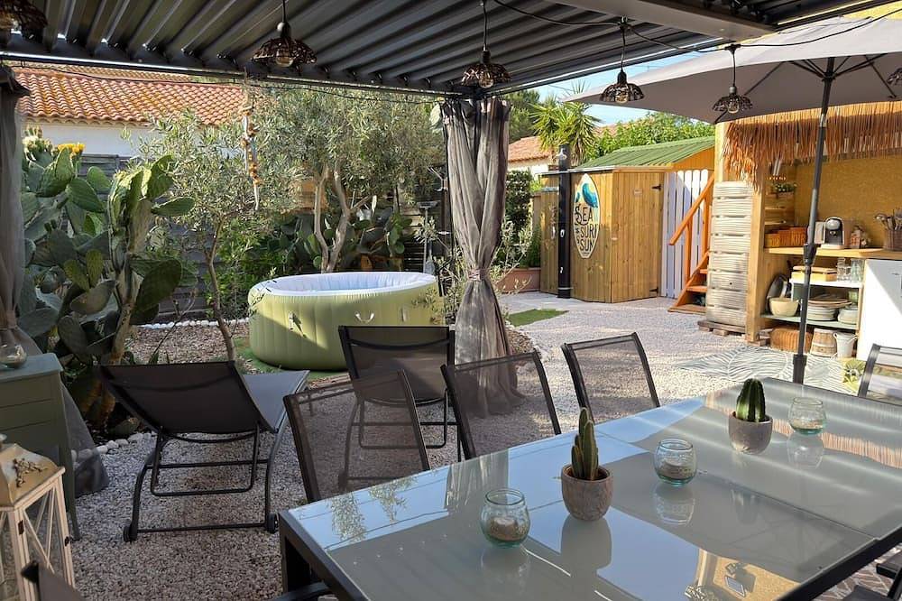Ganze Wohnung, Charming apartment with garden and jacuzzi 3 minutes from the beach in Marseillan-Plage, Marseillan
