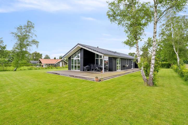 Ferienhaus für 8 Personen, mit Terrasse und Whirlpool sowie Garten, mit Haustier in Skovmose