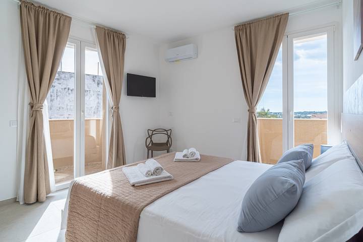 Giualè Portopalo '7' avec vue sur mer, Wi-Fi et climatisation in Portopalo di Capo Passero, Province de Syracuse
