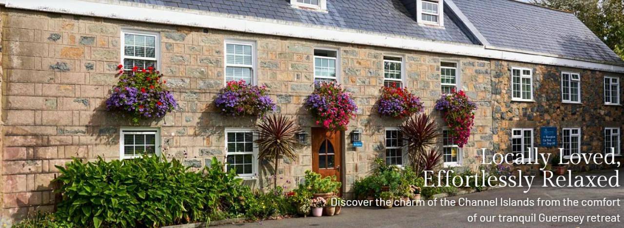 Hotel for 2 people, with Terrace and Yard as well as Pool in Guernsey
