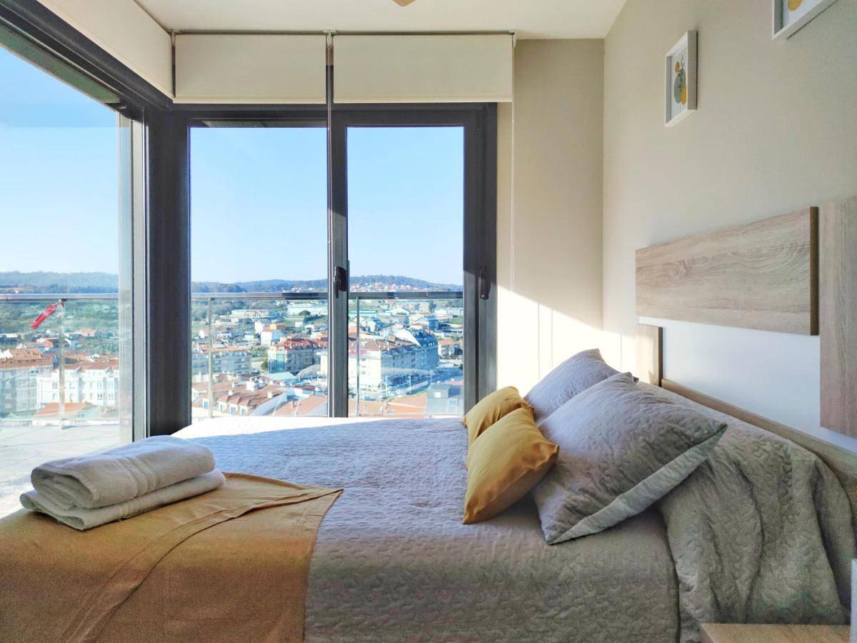 Apartamento entero, Desconectaengalicia Ático La Perla, piscina y pista tenis in Praia de Caneliñas (Sanxenxo), Sanxenxo