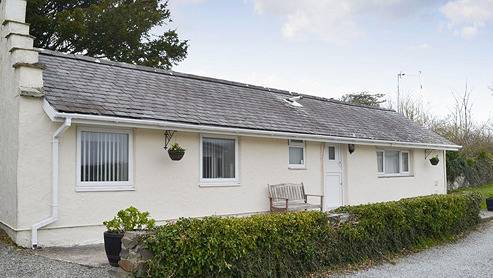 Lodge for 2 people, with garden, with pets in Rhosneigr