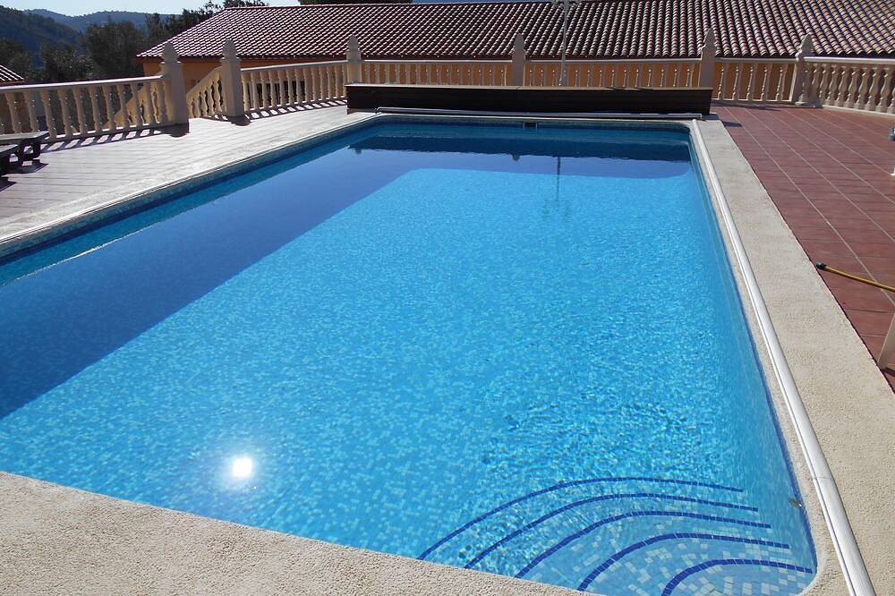 Finca Rustica con aire acondicionado y piscina comunitaria en una zona tranquila. in Xaló, Costa Blanca