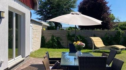 Ferienhaus für 10 Personen, mit Terrasse und Pool sowie Sauna und Garten in Grömitz
