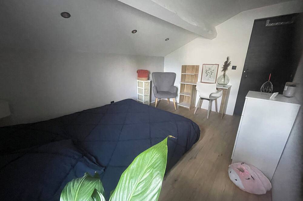 Sleek bedroom in Solaize, Rhône