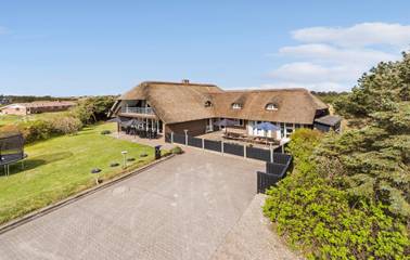 Ferienhaus mit Meerblick für 20 Personen, mit Pool und Terrasse sowie Whirlpool und Sauna am Ringkøbing Fjord
