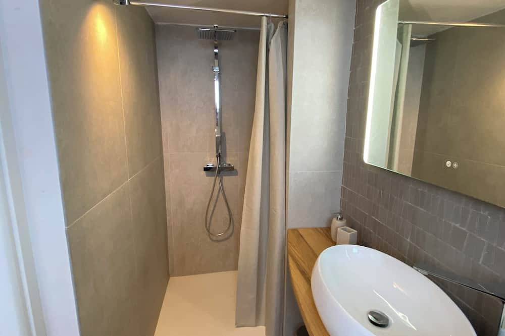In the hills of the Italian Riviera, a fully renovated 47-square-meter loft in Noli, Riviera di Ponente