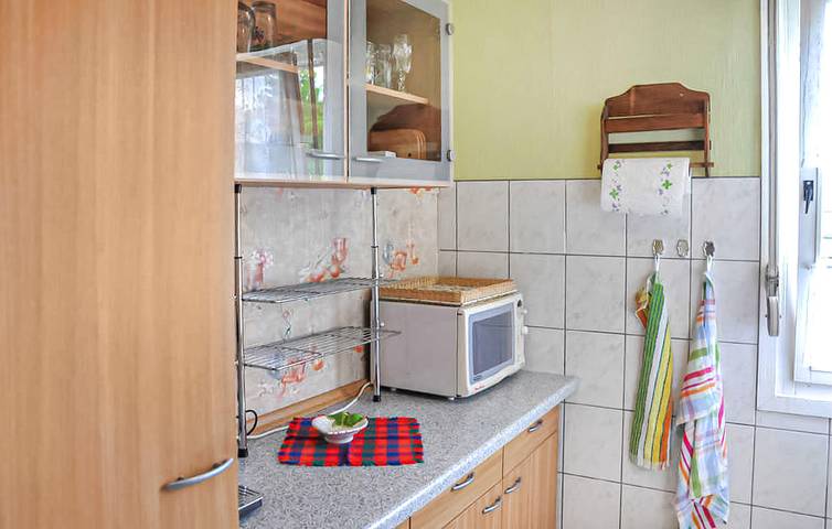 Appartement am Meer mit Parkplatz, Terrasse und Boot - 2 km zum Strand in Wesenberg, Mecklenburg-Strelitz