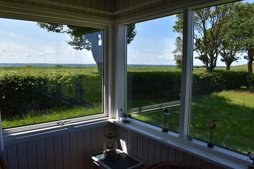 Gemütliches Ferienhaus mit Meerblick gelegen auf der malerischen Halbinsel Langø in Langø, Martofte