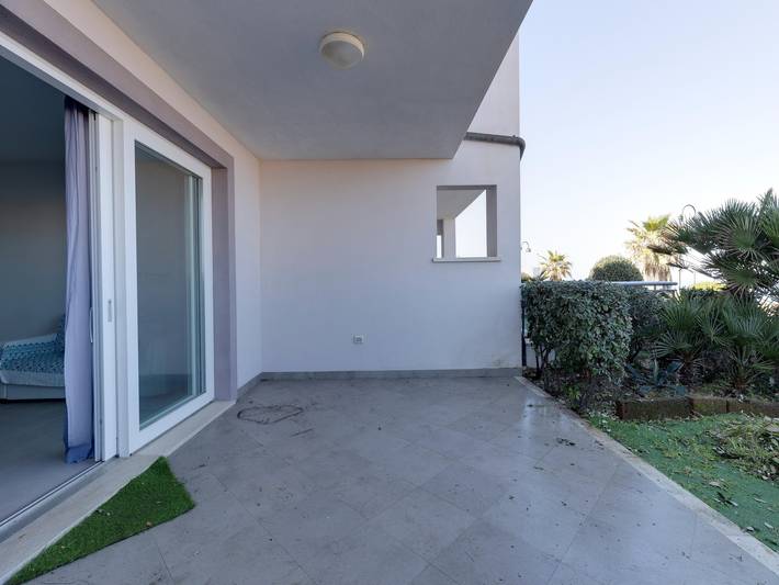 Appartamento intero, Vista mare con aria condizionata e giardino in Lu Bagnu, Castelsardo