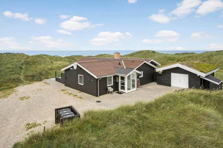 Ferienhaus mit Meerblick für 8 Personen, mit Whirlpool und Sauna sowie Terrasse in Grønhøj Strand